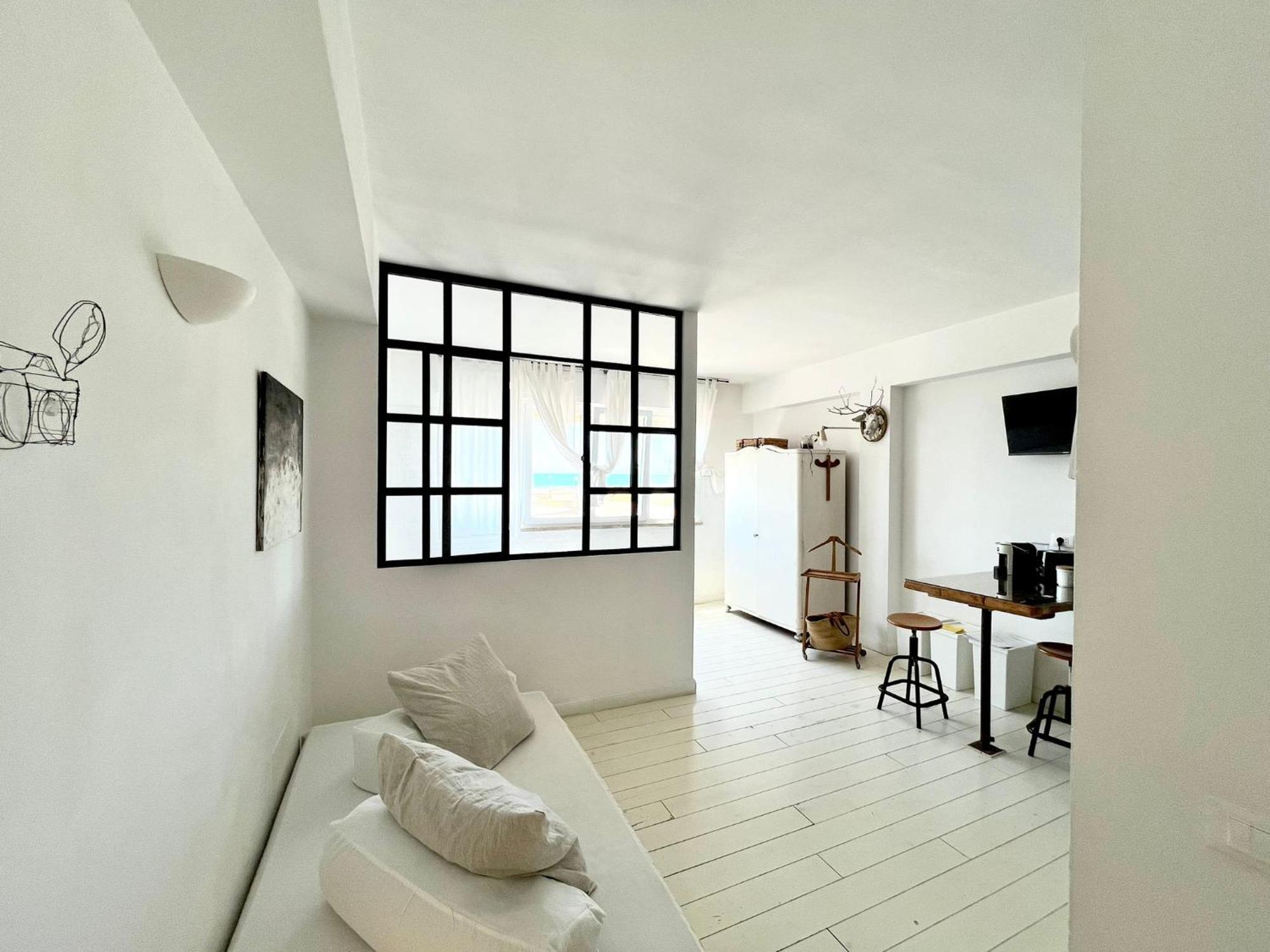 Апартаменты Sunset Loft Ливорно Номер фото