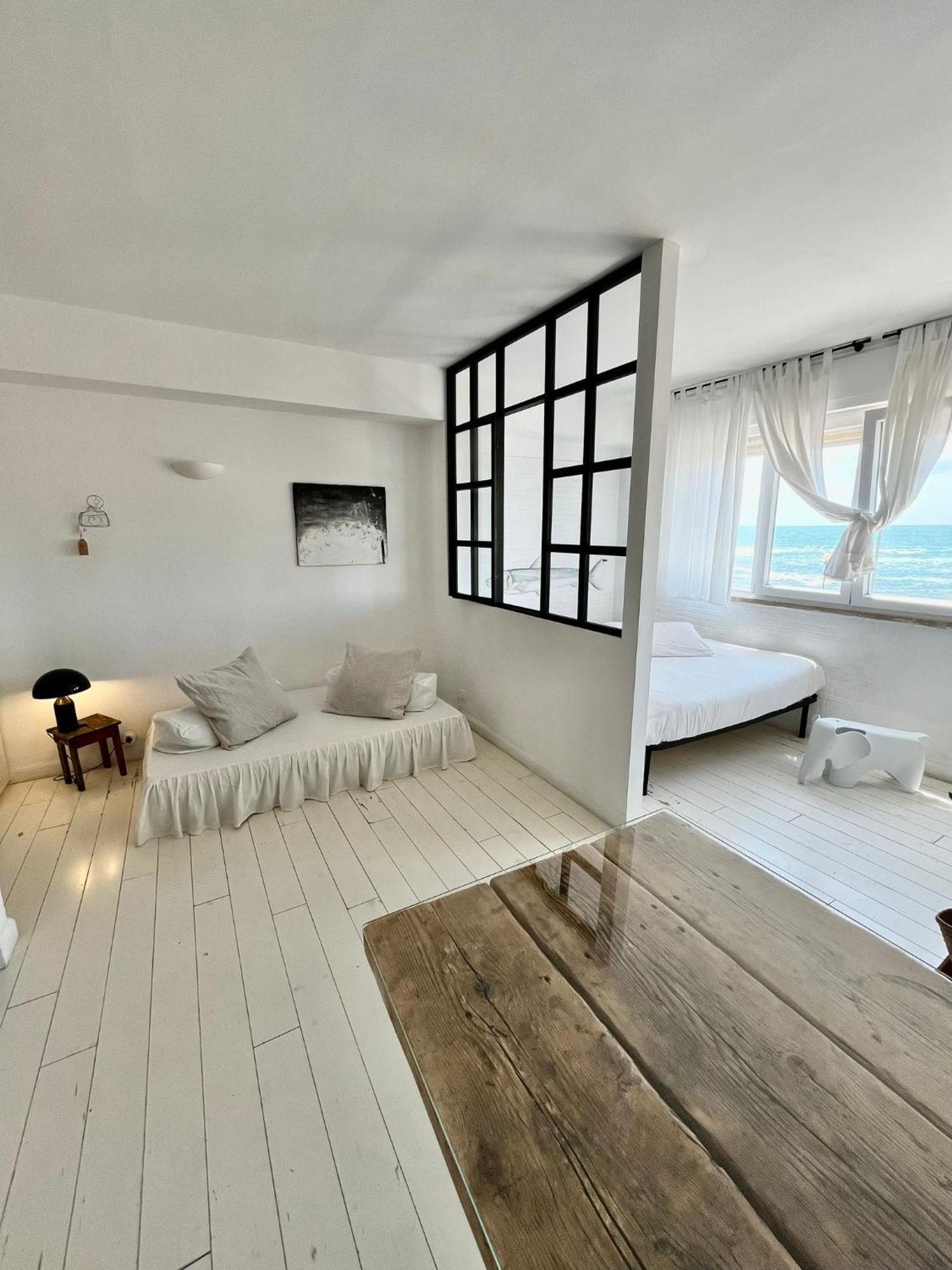 Апартаменты Sunset Loft Ливорно Номер фото