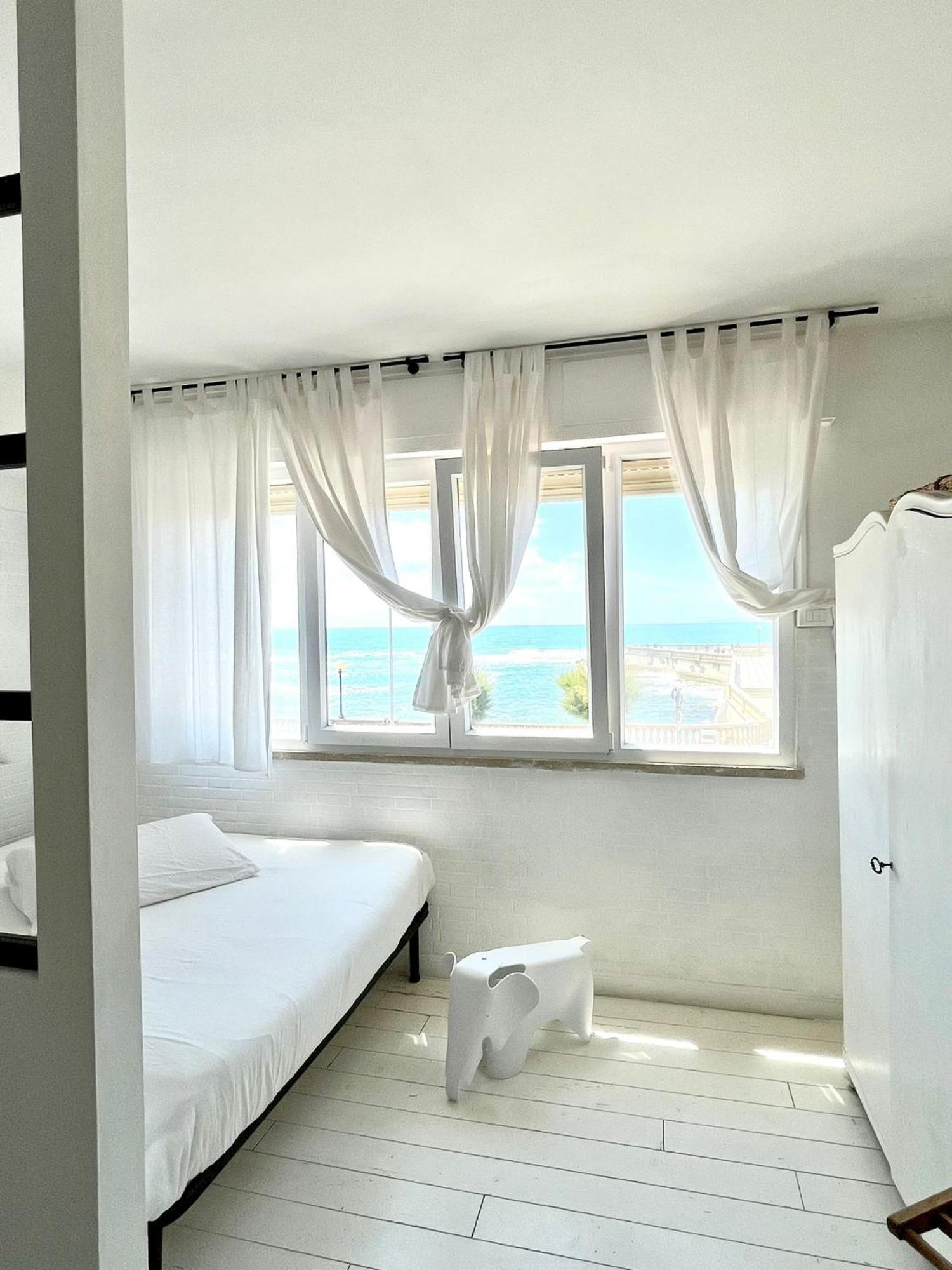 Апартаменты Sunset Loft Ливорно Номер фото