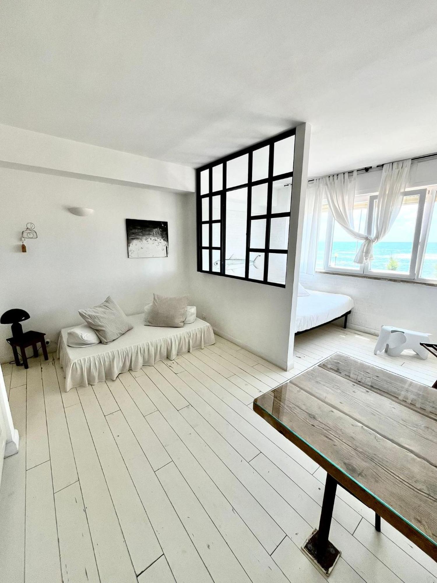 Апартаменты Sunset Loft Ливорно Номер фото