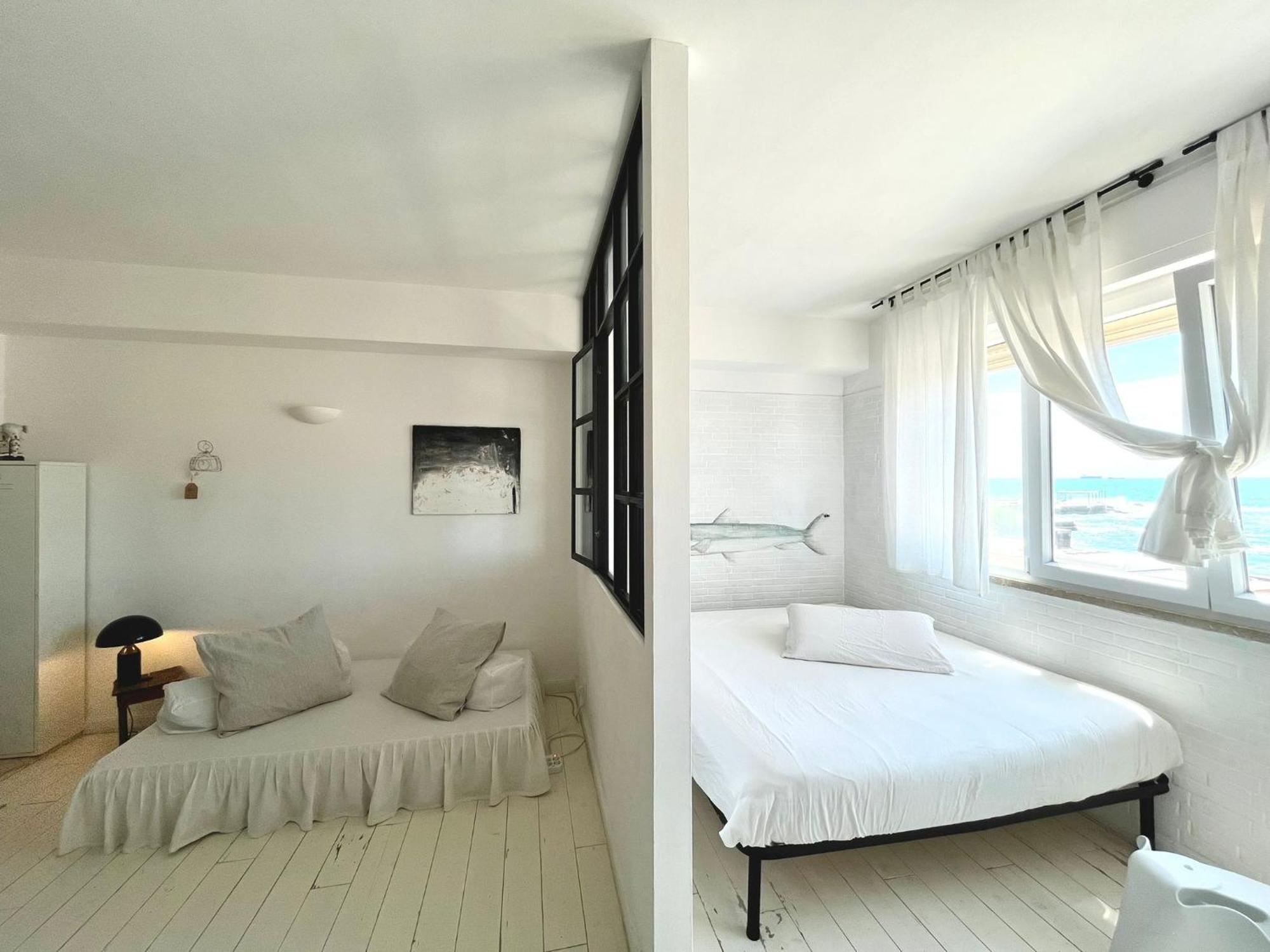 Апартаменты Sunset Loft Ливорно Номер фото