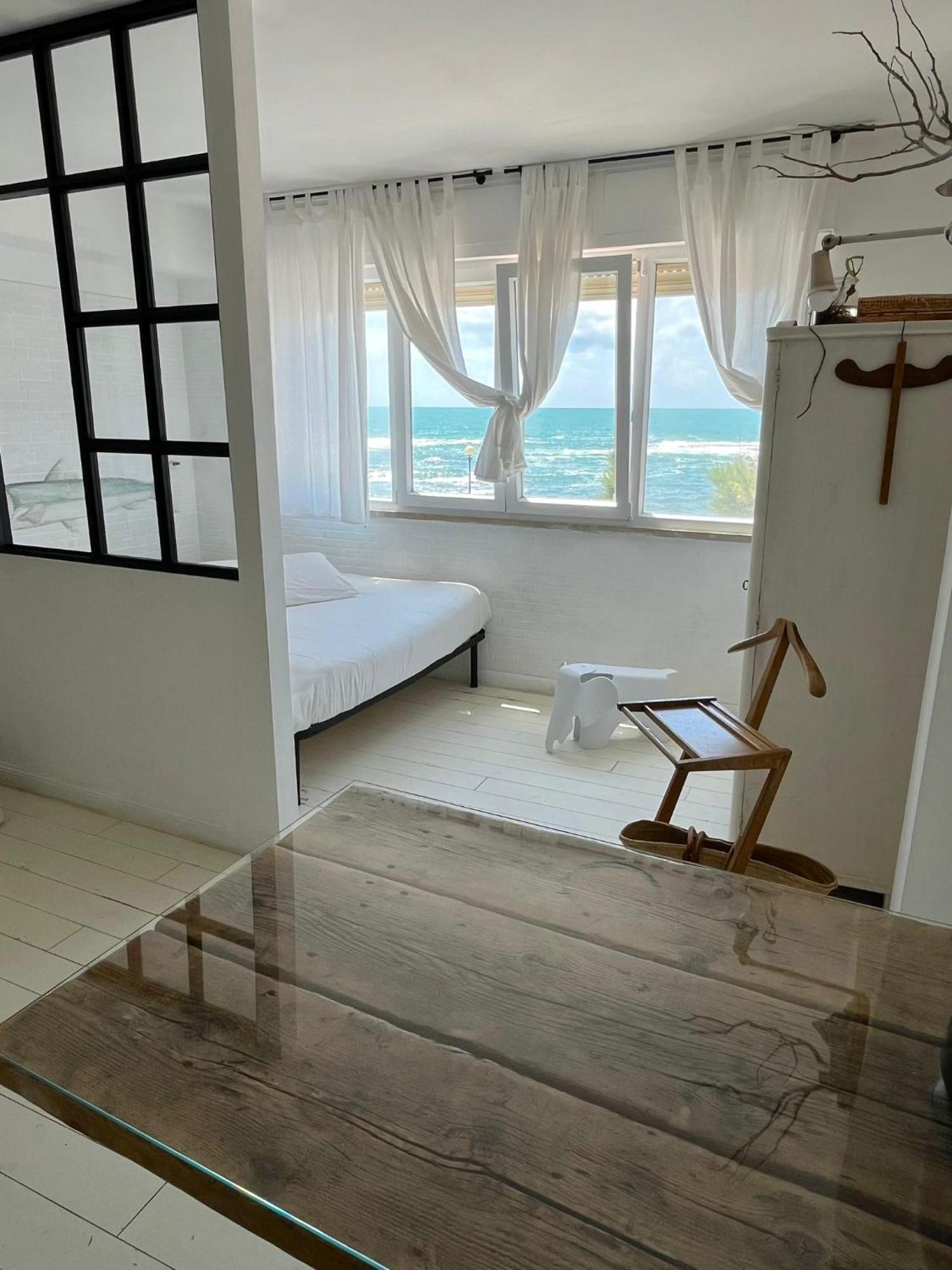 Апартаменты Sunset Loft Ливорно Номер фото